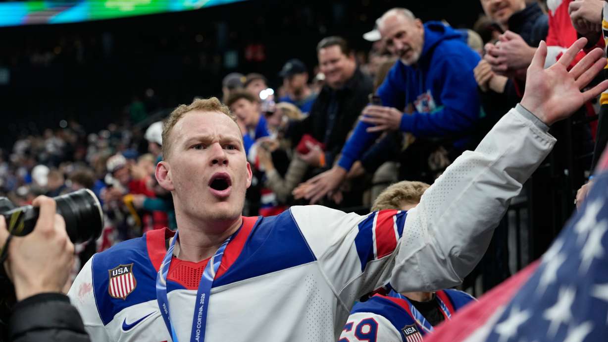 United States' Brady Tkachuk (7) celebrates after the United States defeated Canada in a men's ice hockey gold medal game between Canada and the United States at the 2026 Winter Olympics, in Milan, Italy, Sunday, Feb. 22, 2026.