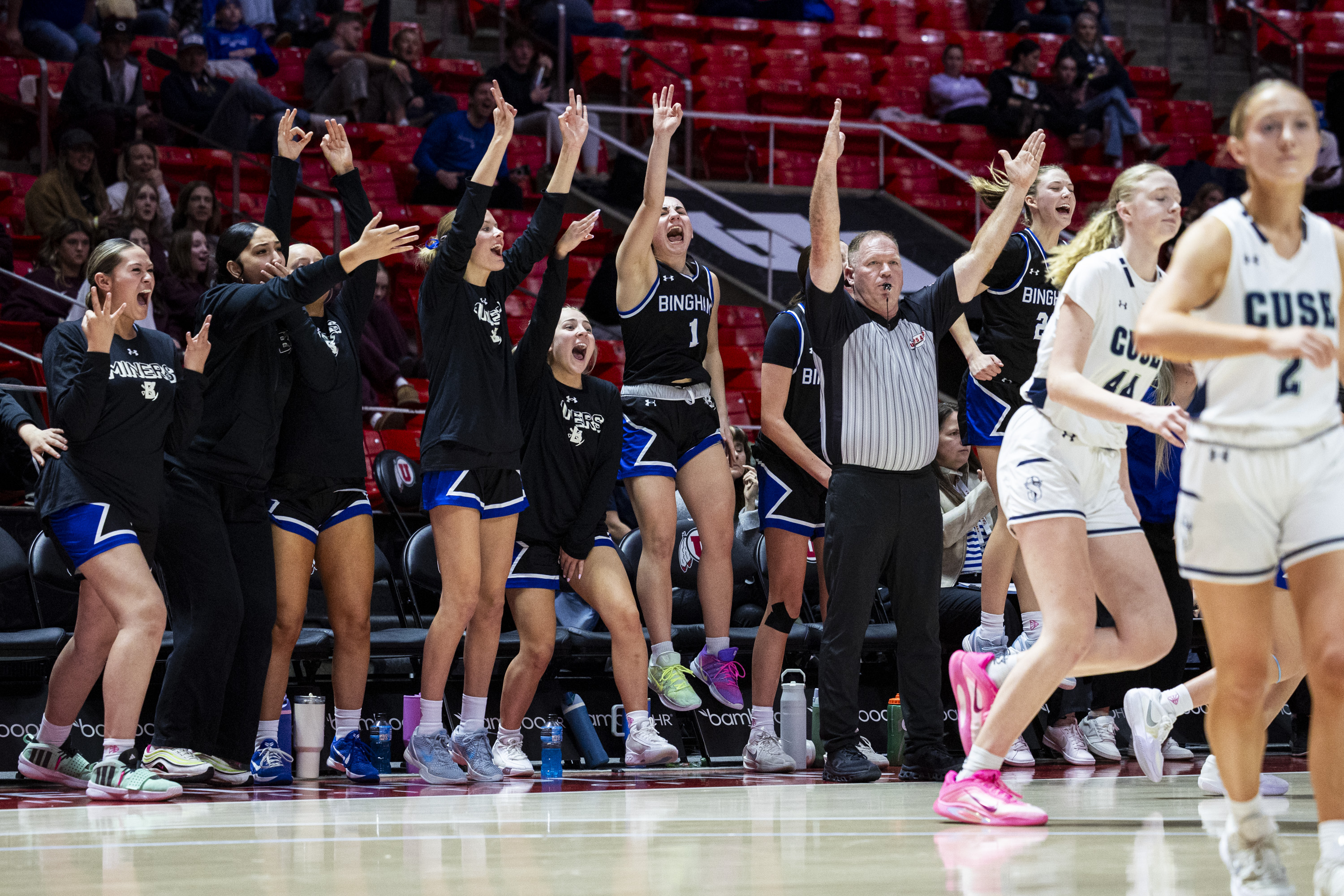 Bingham players celebrate a 3-pointer from one of their teammates during a game against Syracuse in the semifinals of the 6A girls basketball state tournament held at the Huntsman Center in Salt Lake City on Thursday, Feb. 26, 2026.