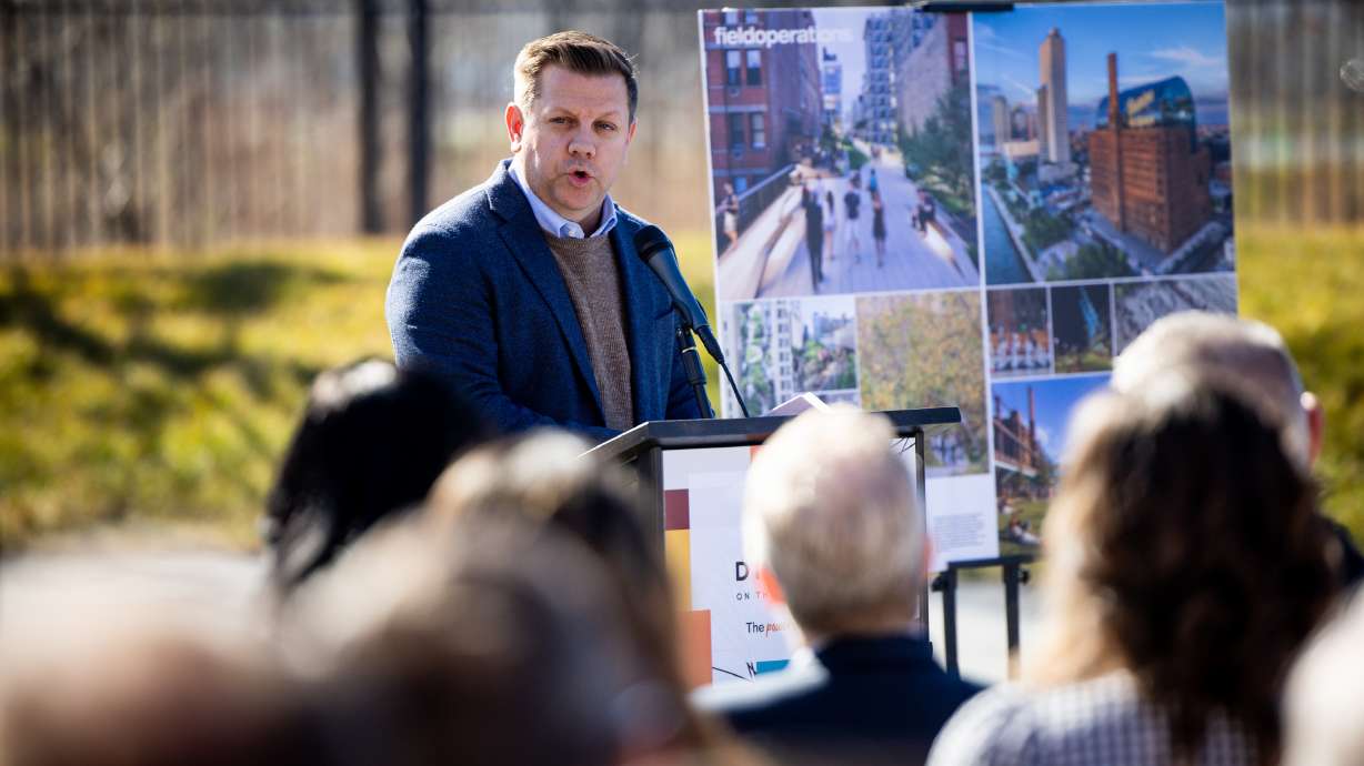 Steve Starks, CEO of the Larry H. Miller Company, speaks during a press conference where community leaders are celebrating the launch of a community-driven plan to revitalize a half-mile stretch of the Jordan River at the Utah State Fairpark in Salt Lake City on Thursday.