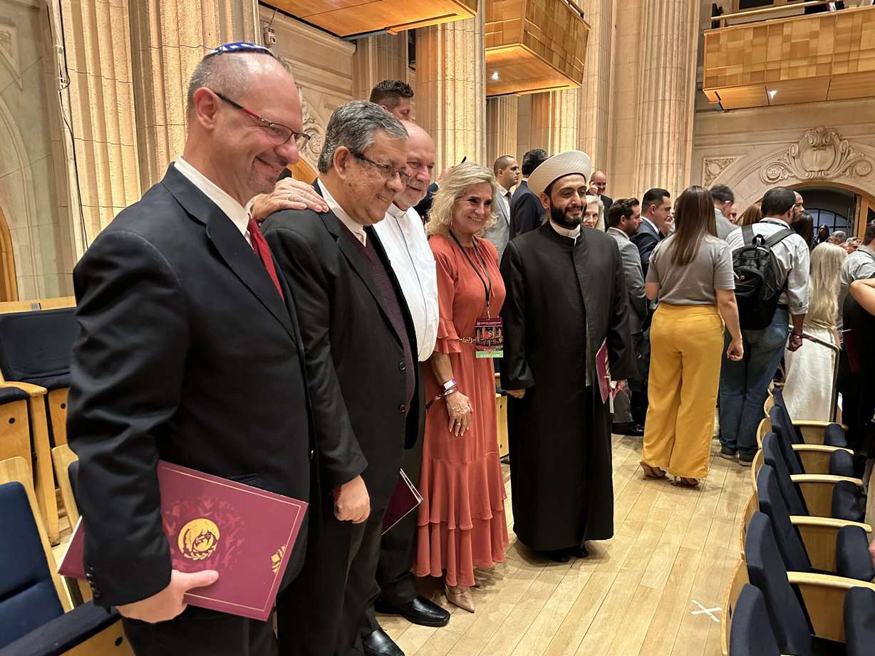 Rabbi Uri Lam with members of The Tabernacle Choir at Temple Square following their performance on Thursday in Brazil. Lam was one of several political and religious dignitaries in attendance.