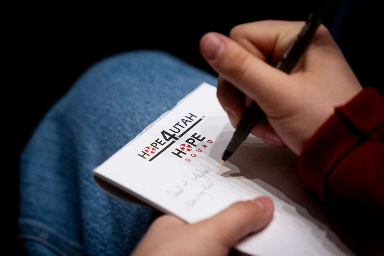 A student writes down what they are good at as part of an activity during a conference teaching suicide prevention training held by Hope4Utah at Mountain View High School in Orem on Feb. 19. Hope4Utah is facing potential funding cuts under a new legislative bill.