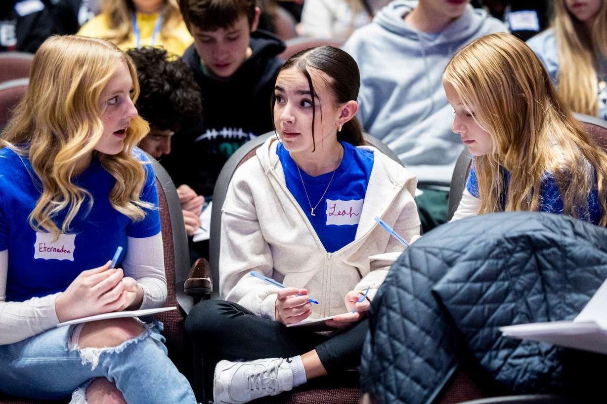 Seventh graders from San Rafael Junior High School, from left, Eternadee Stilson, Leah Garcia and Lauren Braun collaborate on an activity during a conference teaching suicide prevention training held by Hope4Utah at Mountain View High School in Orem on Feb. 19. Founder Greg Hudnall is confident in "peer-to-peer" suicide prevention.