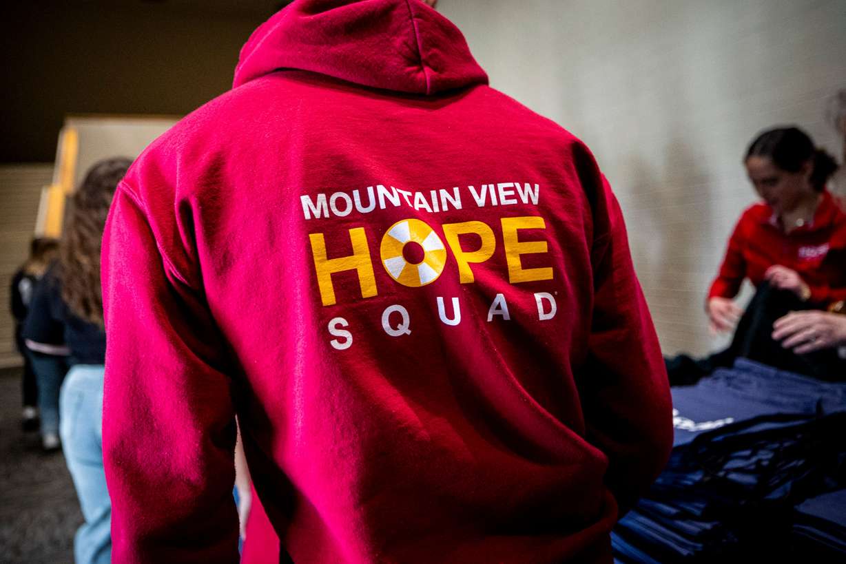A Hope Squad student walks to the auditorium before a conference teaching suicide prevention training held by Hope4Utah at Mountain View High School in Orem on Feb. 19. Hope4Utah is facing potential funding cuts under a new legislative bill.