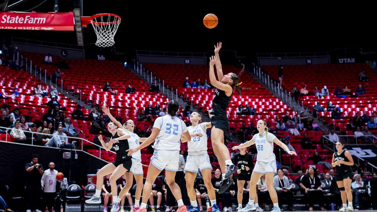 Lone Peak power forward Lave Holdcraft (21) takes a shot against Westlake during a game in the semifinals of the 6A girls basketball state tournament held at the Huntsman Center in Salt Lake City on Thursday, Feb. 26, 2026.