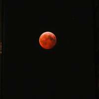 A total lunar eclipse will turn the moon blood red on Tuesday across several continents