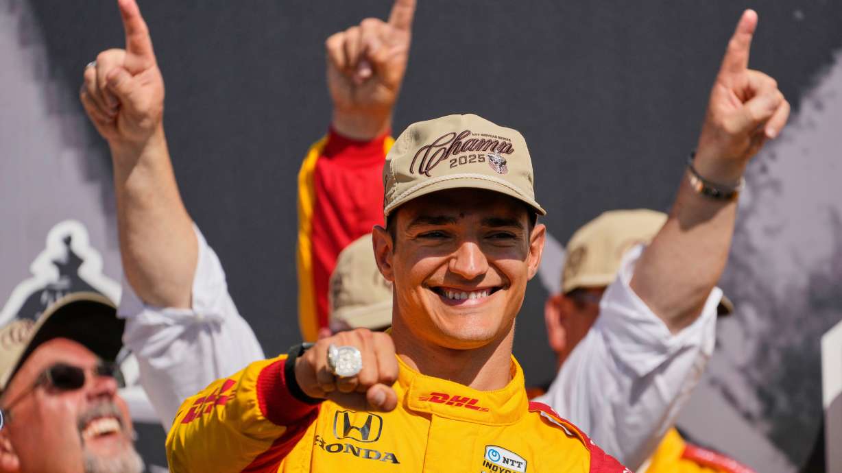 FILE - Alex Palou celebrates after winning the IndyCar championship Sunday, Aug. 31, 2025, at Nashville Superspeedway in Lebanon, Tenn.