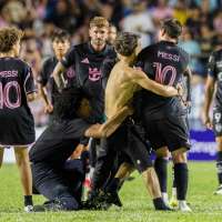 Lionel Messi knocked down as fans storm the pitch during Inter Miami friendly in Puerto Rico