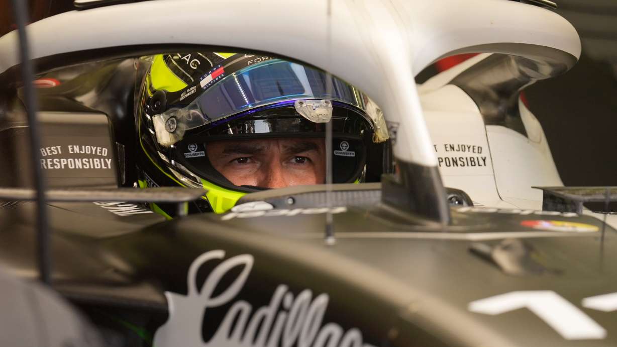 Cadillac driver Sergio Perez of Mexico waits in his car during a Formula One pre-season test at the Bahrain International Circuit in Sakhir, Bahrain, Wednesday, Feb. 11, 2026.