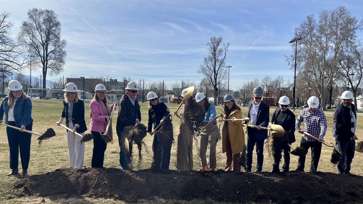 Salt Lake City leaders and project officials celebrate the start of a project to revamp Pioneer Park on Friday. Construction will impact the traditional layout of the Salt Lake City Downtown Farmers Market this summer.
