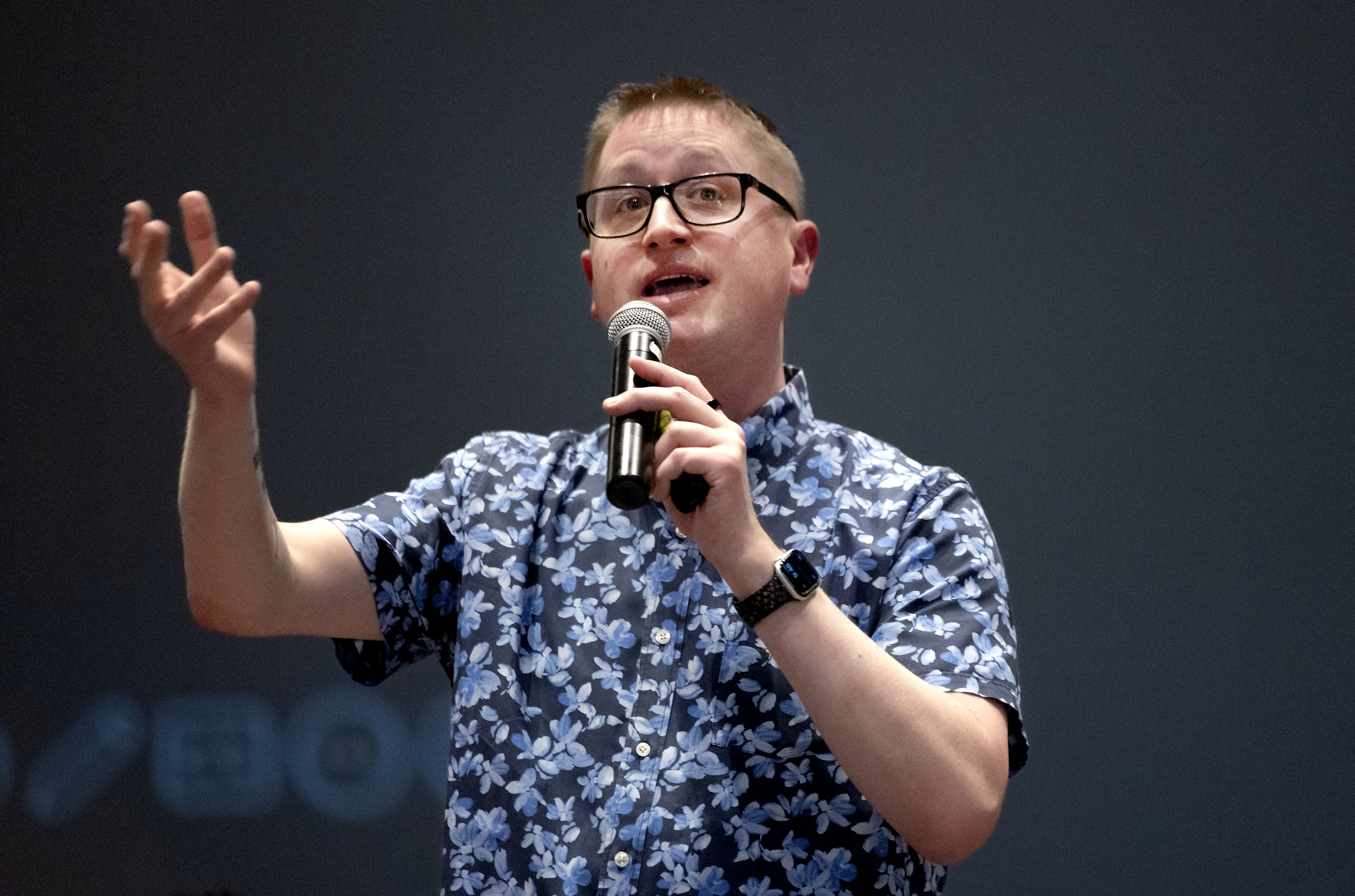 Author John Schu speaks to students during Operation Literacy at Bryant Middle School in Salt Lake City on Friday. Hundreds of Salt Lake City School District students received free books as part of the book drop event.