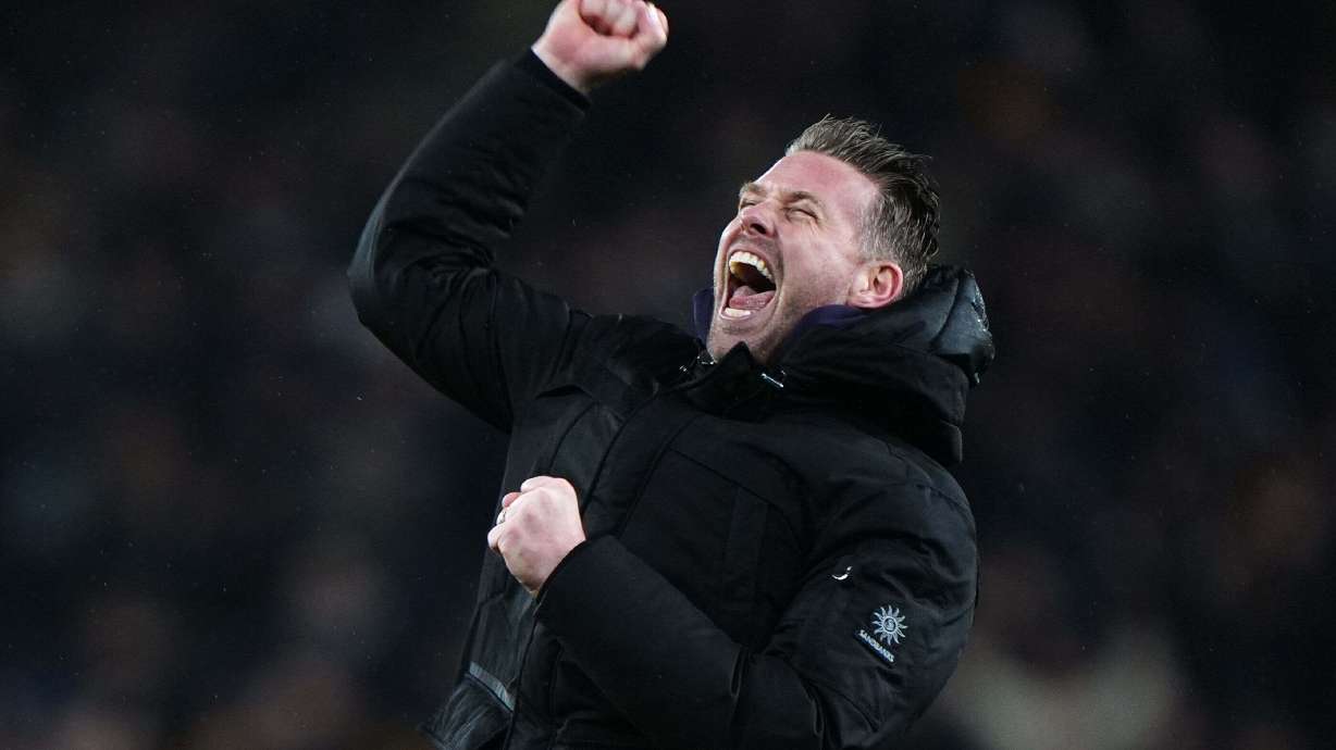 Wolverhampton Wanderers manager Rob Edwards celebrates their win after their English Premier League soccer match against Aston Villa in Wolverhampton, England, Friday, Feb. 27, 2026.