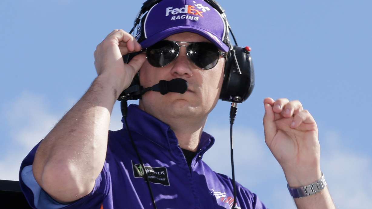 FILE - Christopher Gabehart, crew chief for Denny Hamlin, watches practice for a NASCAR Cup Series auto race on Saturday, Nov. 16, 2019, at Homestead-Miami Speedway in Homestead, Fla.