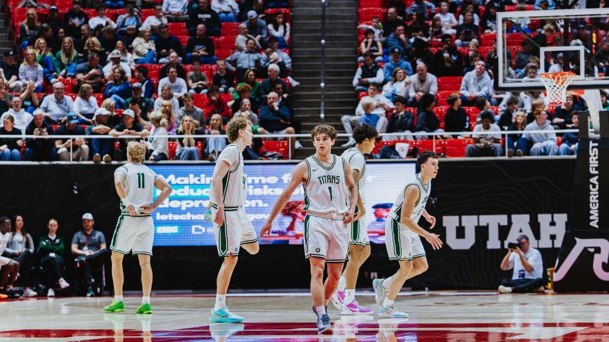 Olympus' Gavin Lowe (1) celebrates in the 5A boys basketball championship game against Bountiful, Friday, Feb. 27, 2026 in Salt Lake City.