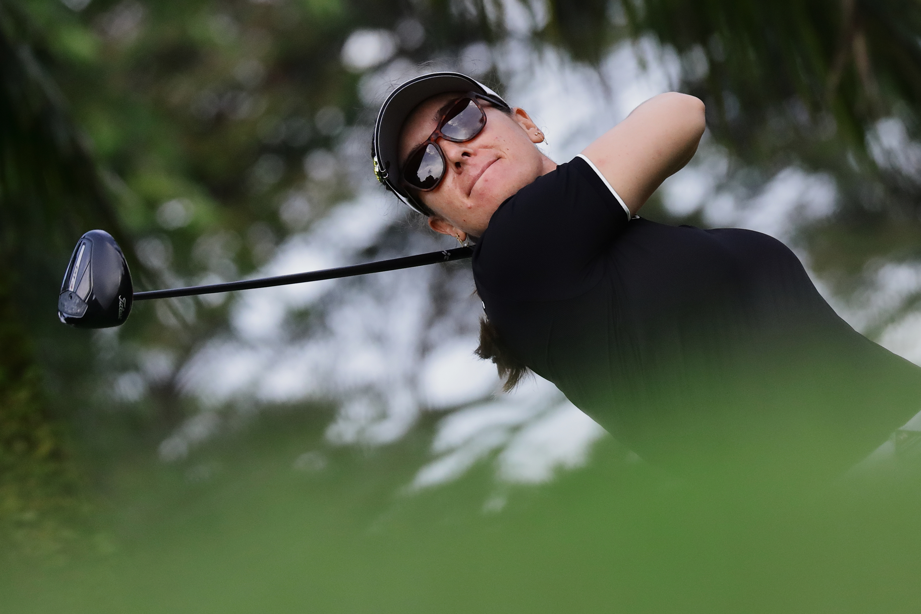 Hannah Green of Australia tees off during the HSBC Women's World Championship at Sentosa Golf Club in Singapore, Thursday, Feb. 26, 2026. 