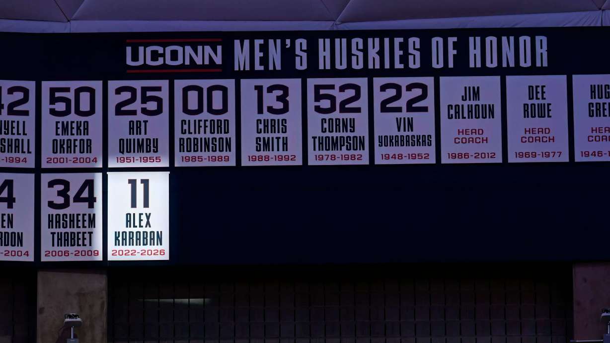 UConn forward Alex Karaban's name and number is highlighted during a pregame ceremony adding Karaban to the Huskies of Honor before an NCAA college basketball game between UConn and Seton Hall, Saturday, Feb. 28, 2026, in Storrs, Conn.