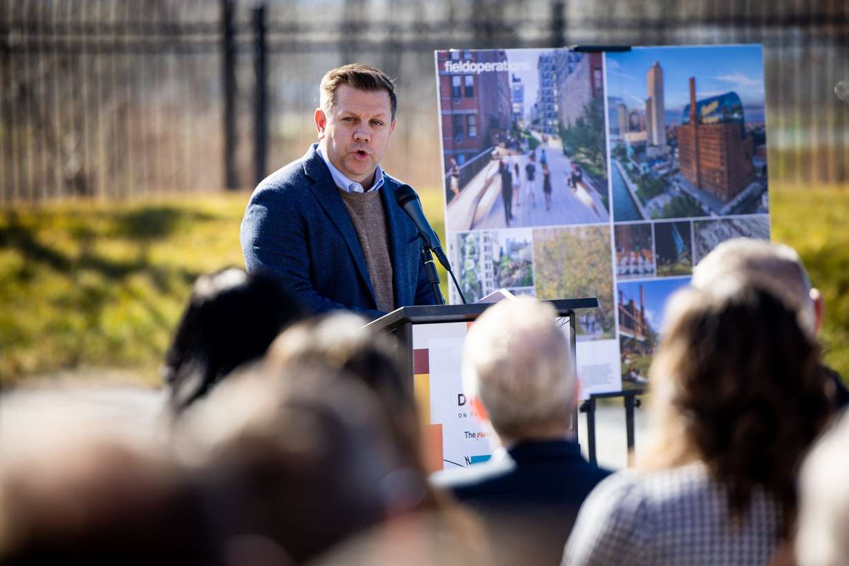 Steve Starks, CEO of the Larry H. Miller Company, speaks during a press conference where community leaders are celebrating the launch of a community-driven plan to revitalize a half-mile stretch of the Jordan River at the Utah State Fairpark in Salt Lake City on Thursday.