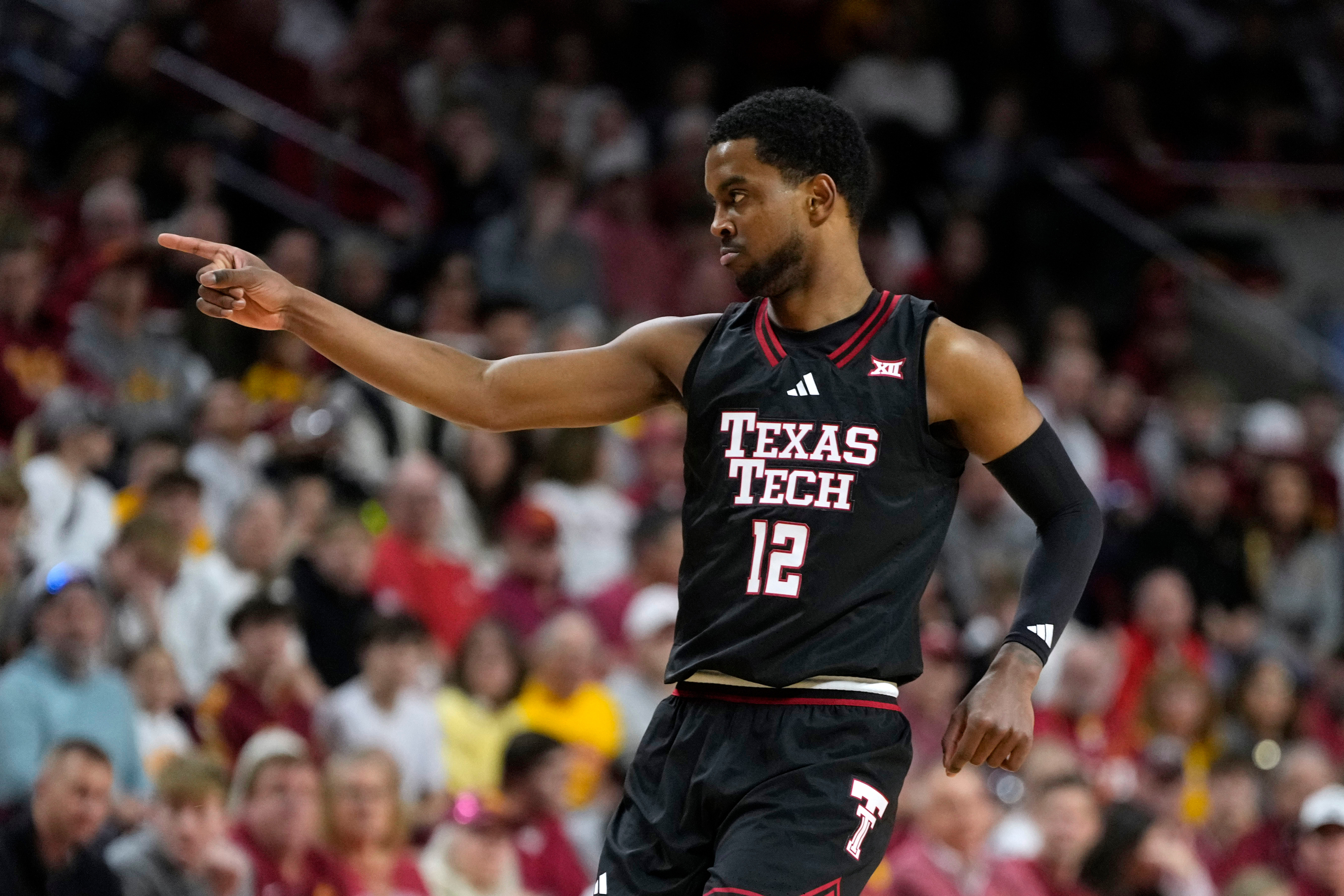 Texas Tech forward Donovan Atwell reacts after making a three-point basket during the first half of an NCAA college basketball game against Iowa State, Saturday, Feb. 28, 2026, in Ames, Iowa. 