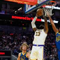 Luka Doncic scores 26 points, LeBron James adds 22 as Lakers run away from Warriors for 129-101 win