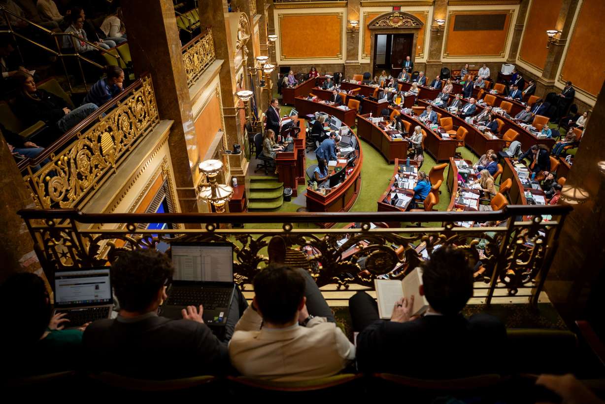 People watch representatives gathered in the Utah House of Representatives Chamber during the legislative session at the Capitol in Salt Lake City on Feb. 24.