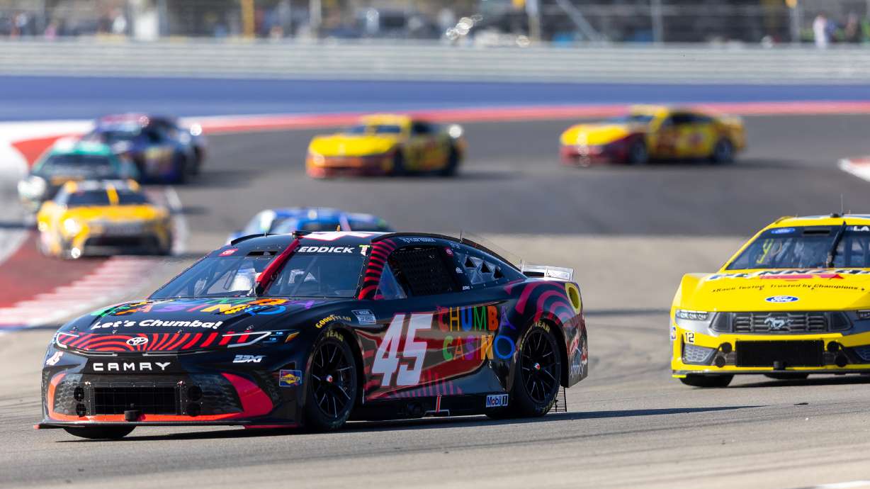23XI Racing's Tyler Reddick (45) and Team Penske's Ryan Blaney drive through Turn 13 during a NASCAR Cup Series auto race in Austin, Texas, Sunday, March 1, 2026.