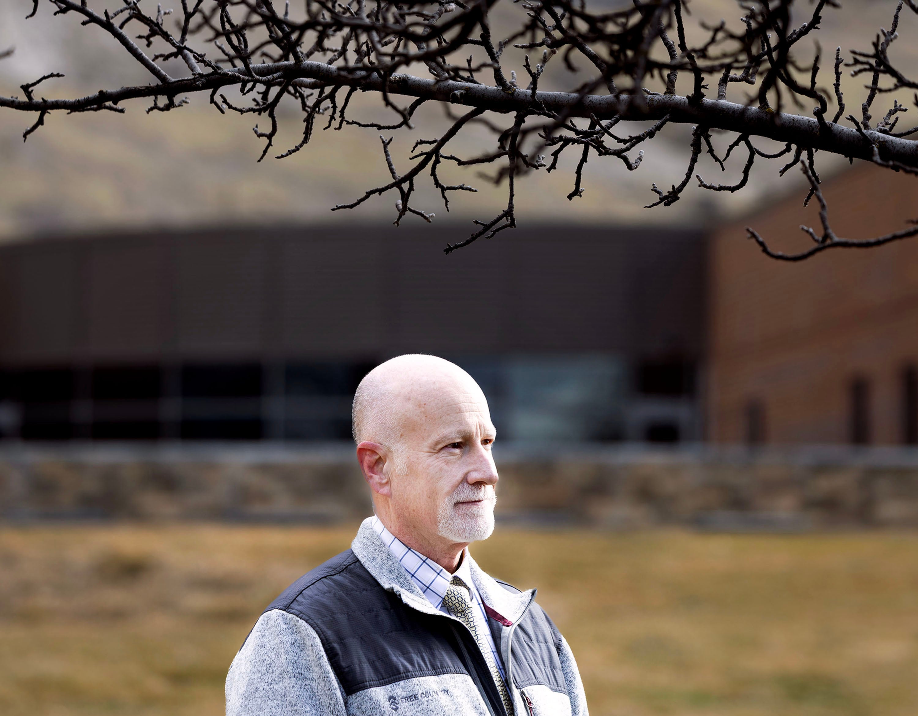 Dallas Earnshaw, director of the Utah State Hospital, stands outside the pediatrics building on the hospital’s campus in Provo on Feb. 17, 2026. Earnshaw is superintendent at the Utah State Hospital in Provo.