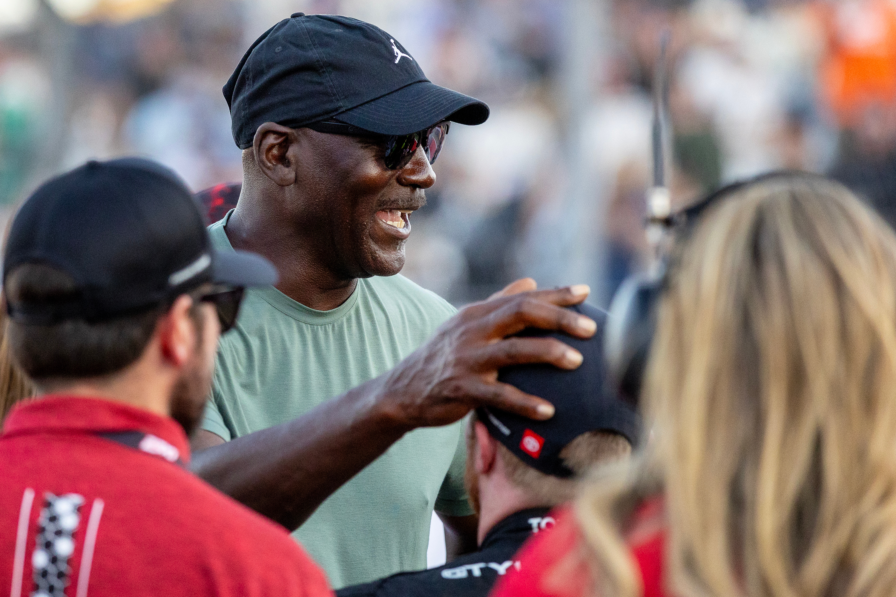 Team co-owner Michael Jordan celebrates by 23XI Racing's Tyler Reddick during a NASCAR Cup Series auto race in Austin, Texas, Sunday, March 1, 2026.