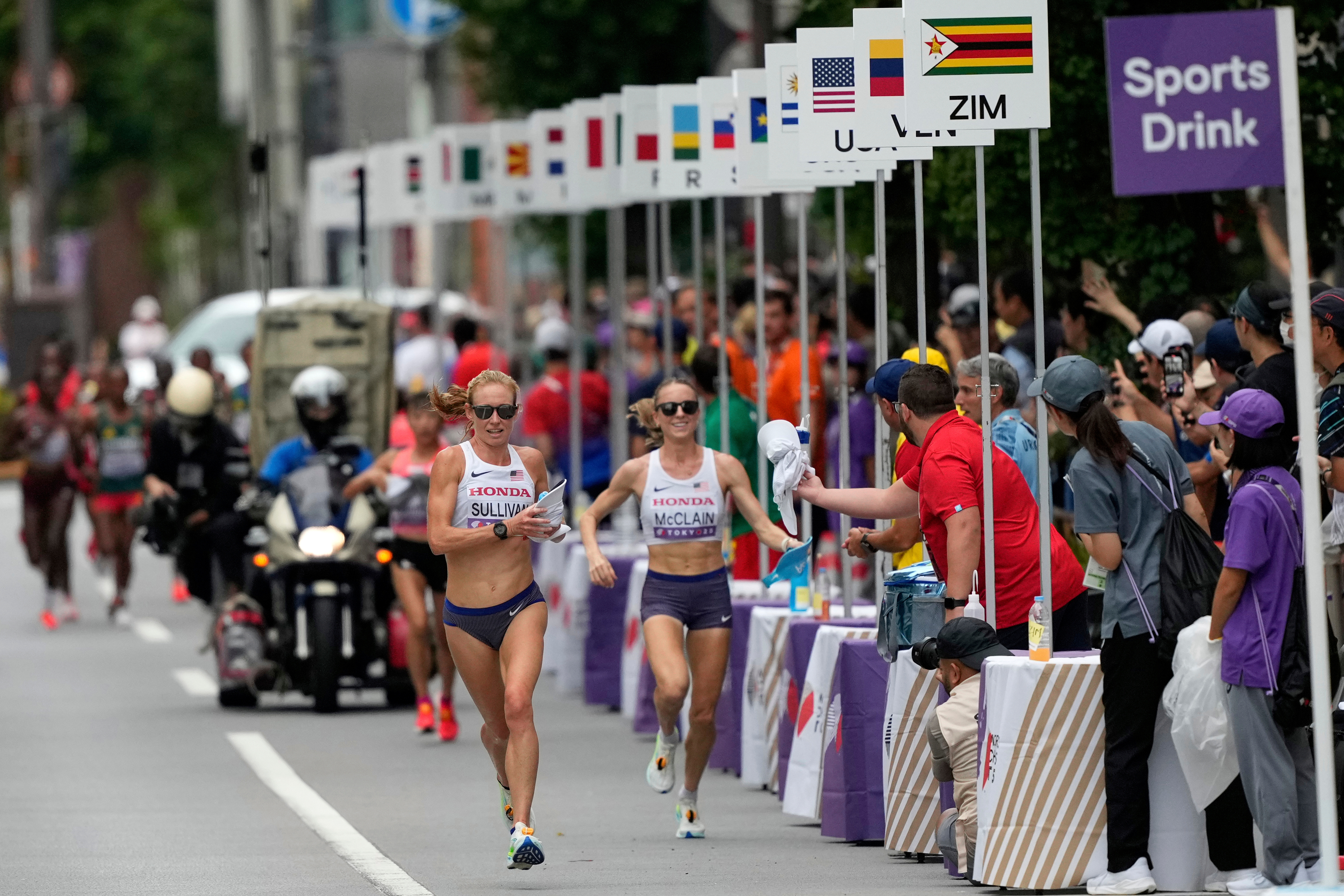 FILE - United States' Susanna Sullivan, left, and United States' Jessica McClain race in the women's marathon at the World Athletics Championships in Tokyo, Sept. 14, 2025. 