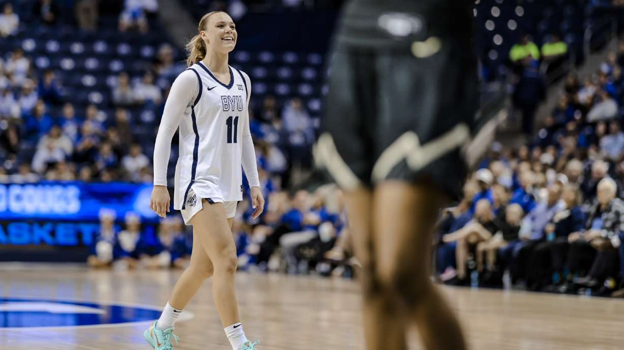 BYU guard Delaney Gibb smiles after a shot during the Cougars' 75-62 win over Colorado in a Big 12 women's basketball game, Saturday, Feb. 28, 2026 at the Marriott Center in Provo, Utah.