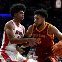 Bradley scores 17 as No. 2 Arizona clinches outright Big 12 title with 73-57 win over No. 6 Iowa St