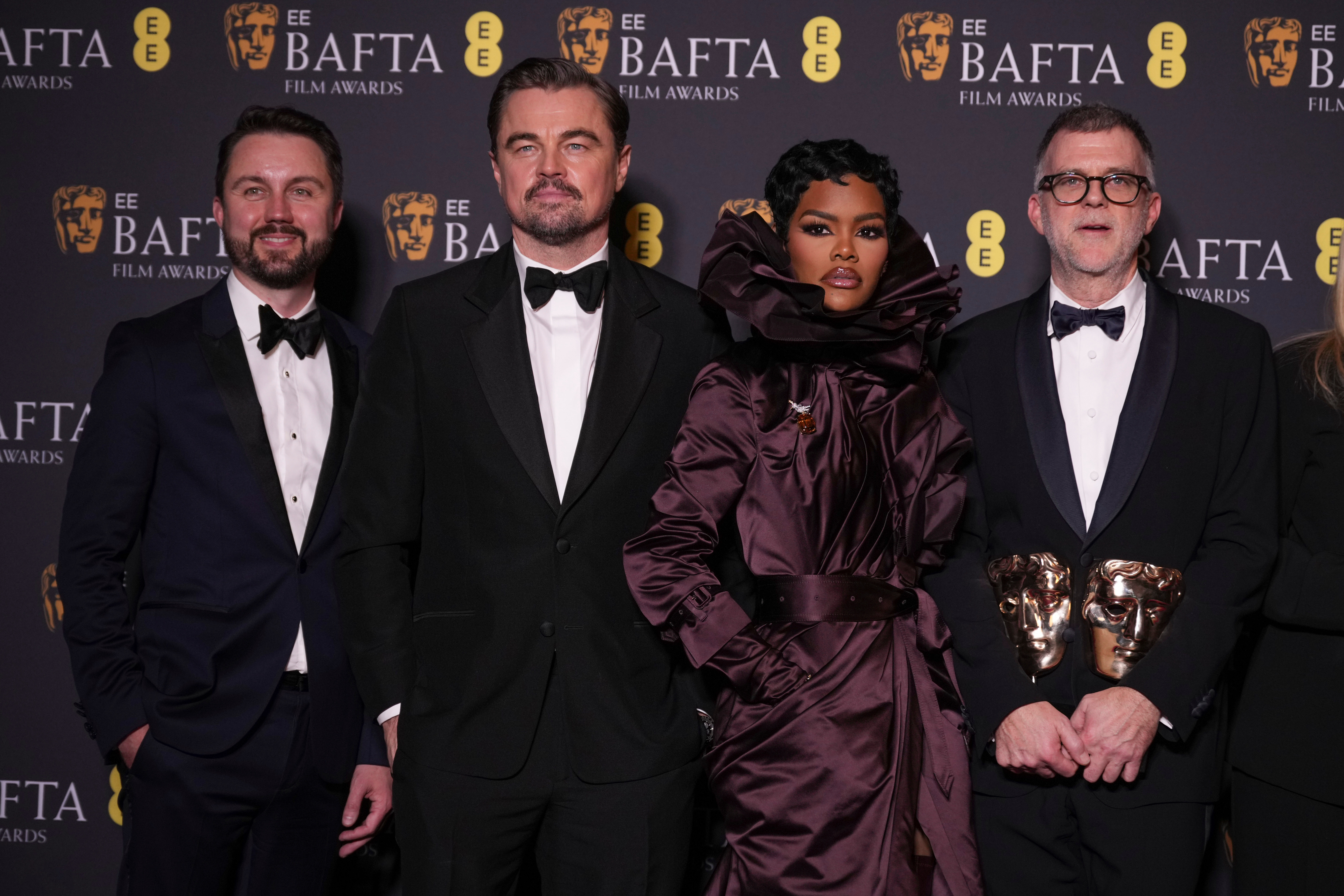 Andy Jurgensen, Leonardo DiCaprio, Teyana Taylor, and Paul Thomas Anderson pose with the awards for best director, cinematography, and adapted screenplay for "One Battle After Another" at the 79th British Academy Film Awards, BAFTA's, in London, Feb. 22. The Oscar for best picture is coming down to the wire between the film and "Sinners."