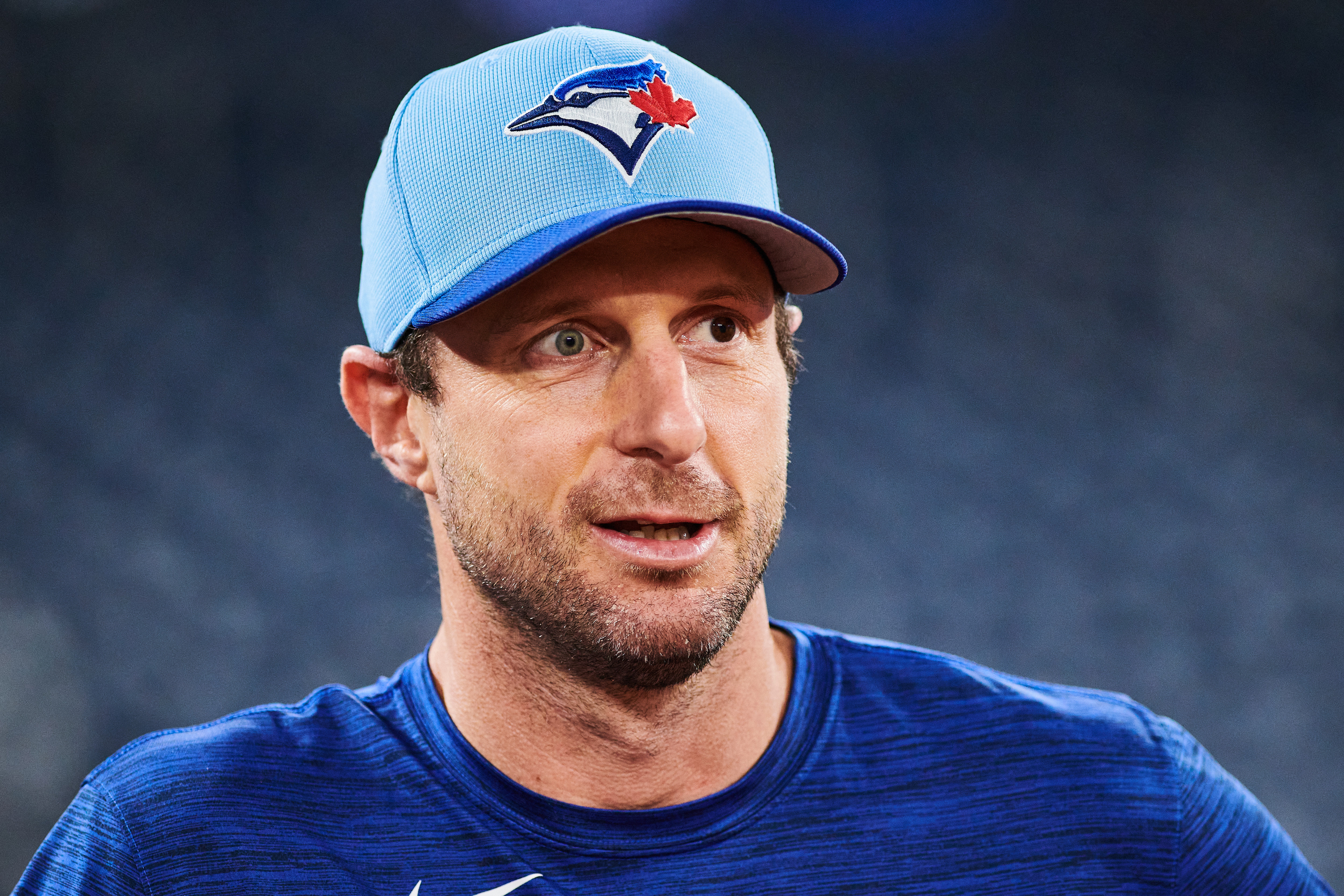 FILE - Toronto Blue Jays' Max Scherzer (31) looks on before batting practice Saturday, Oct. 18, 2025, in Toronto, a day ahead of Game 6 in baseball's American League Championship Series against the Seattle Mariners.