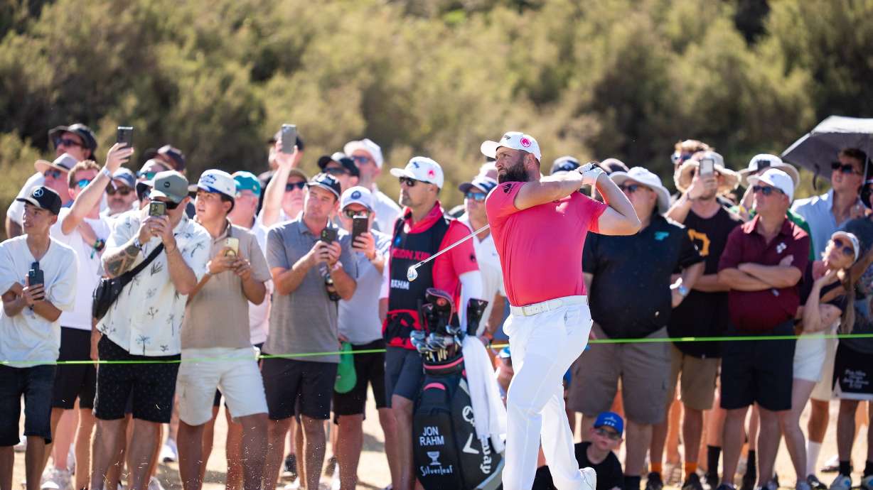Captain Jon Rahm of Legion XIII hits his shot from the 13th fairway during the third round of the LIV Golf tournament at Grange Golf Club, Saturday, Feb 14, 2026 in Adelaide, Australia.