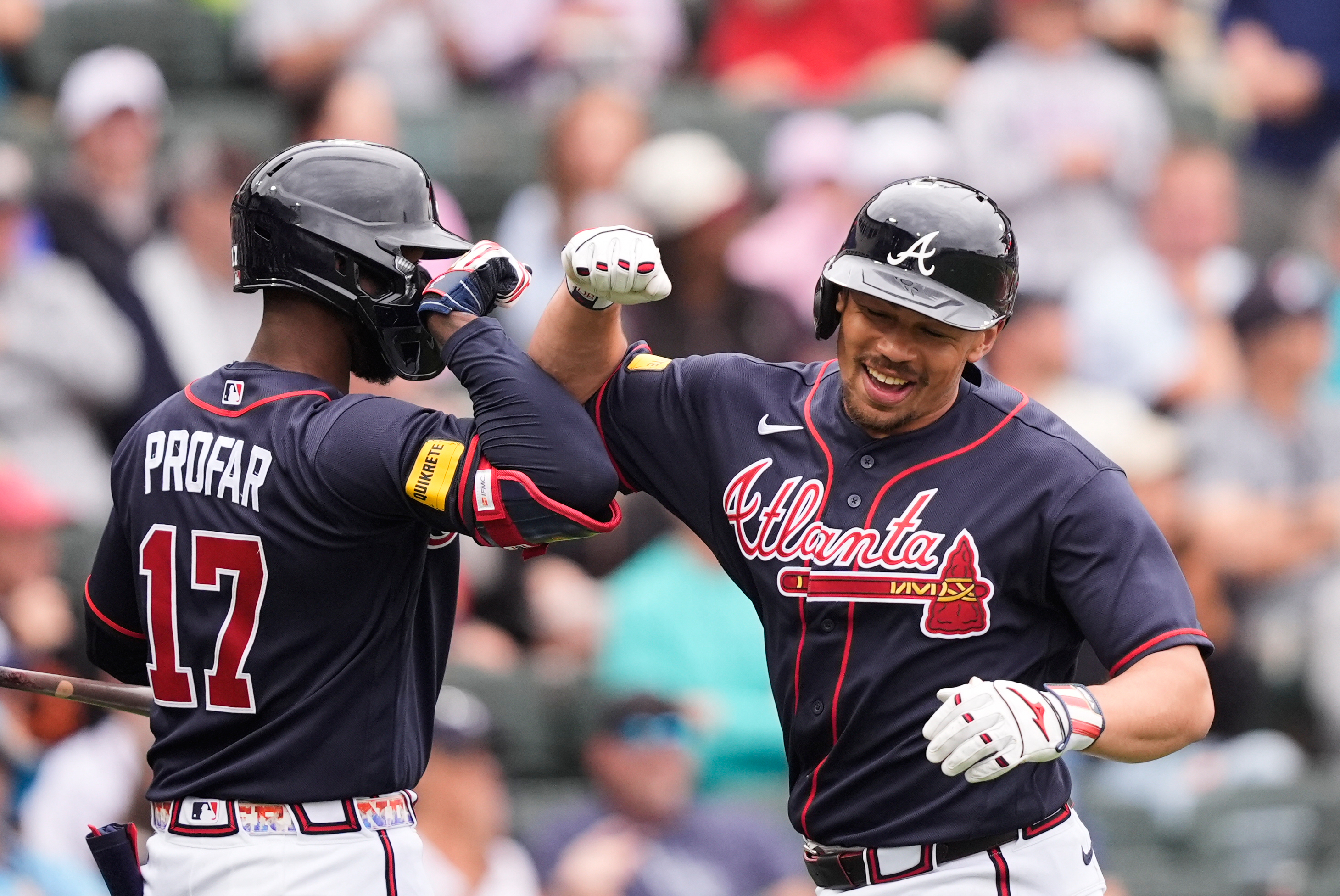 Atlanta Braves Drake Baldwin is greeted by Jurickson Profar after hitting a solo home run in the third inning of a spring training baseball game against the Minnesota Twins in North Port, Fla., Sunday, Feb. 22, 2026.