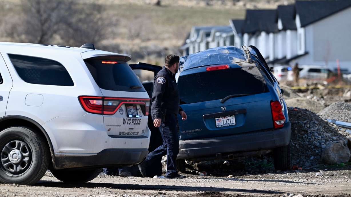 Police respond to a crash in West Valley City on Tuesday, where a 15-year-old girl was killed.