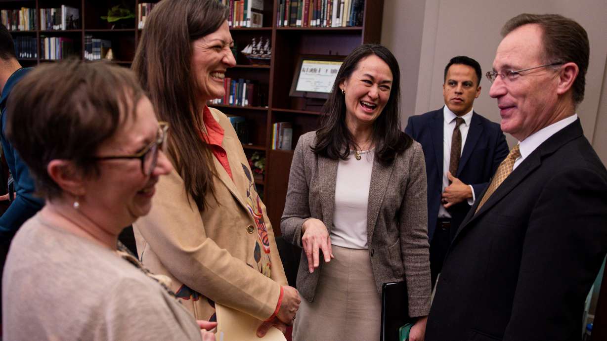 Jenny Reeder and Sharalyn Howcroft speak with Sister Kristin M. Yee, of The Church of Jesus Christ of Latter-day Saints, and General Authority Seventy Elder Kyle S. McKay, during a release event for “Rise Up and Speak: Selected Discourses from Eliza R. Snow” by The Church Historian’s Press at the Church History Library on Tuesday.
