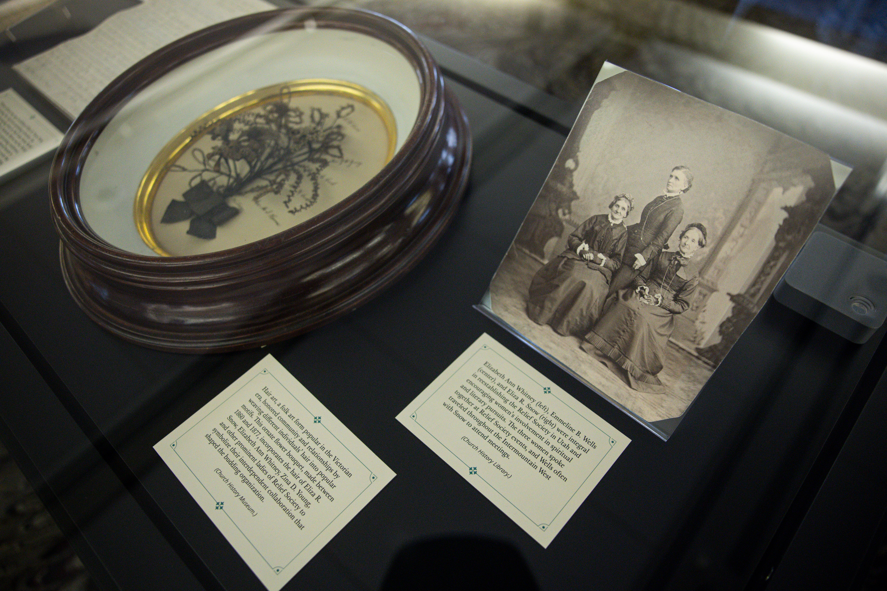 Artifacts from Eliza R. Snow’s life are seen in display cases at the Church History Library on Tuesday.
