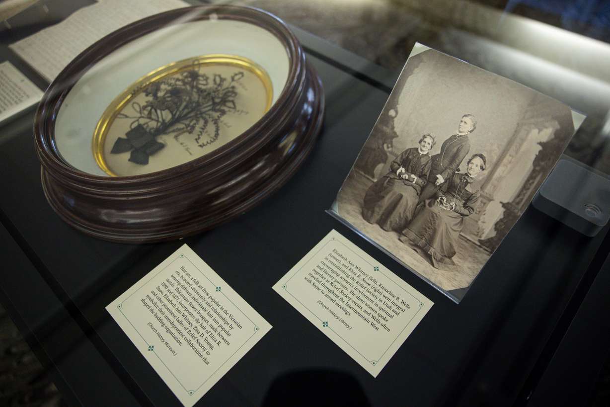 Artifacts from Eliza R. Snow’s life are seen in display cases at the Church History Library on Tuesday.