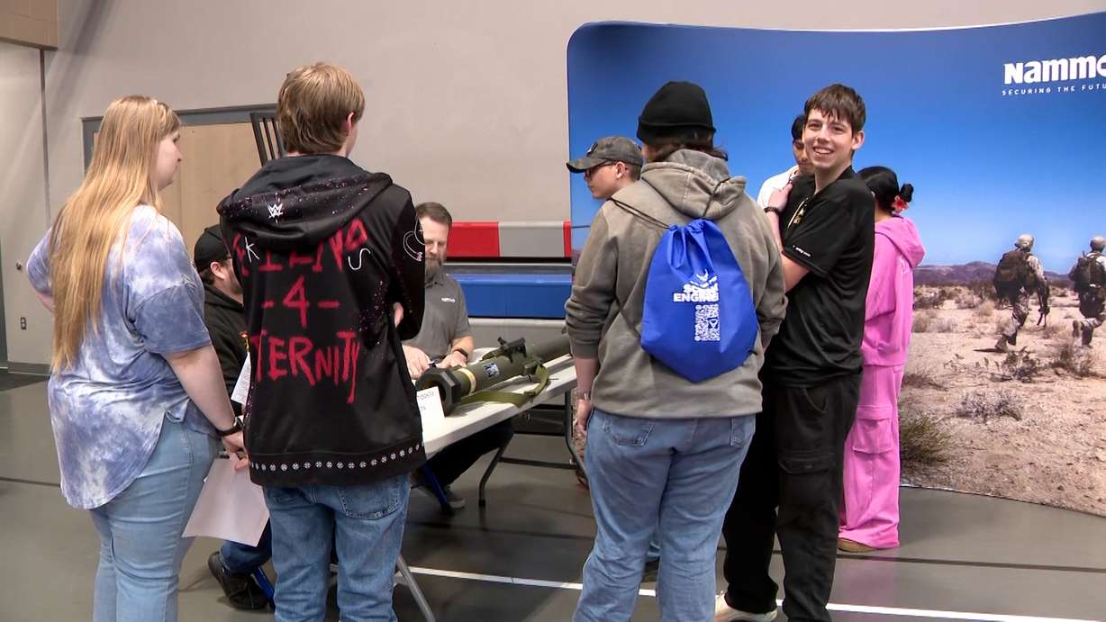 Ben Lomond High School students interacting with aerospace booths during the school’s career pathways fair on Tuesday. Dozens of companies filled the school's athletic center to show what opportunities exist in engineering, manufacturing, and advanced technology.