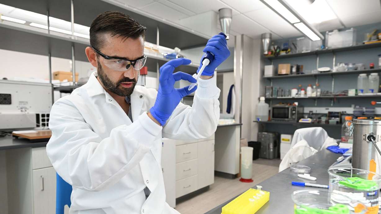 John McCullough, research associate professor, prepares samples of protein complexes to view on a high-resolution electron microscope at the Sundquist laboratory in Department of Biochemistry at the University of Utah in Salt Lake City on Sept. 10, 2024. Lawmakers have been pressing for increased research funding in this year's legislative session.
