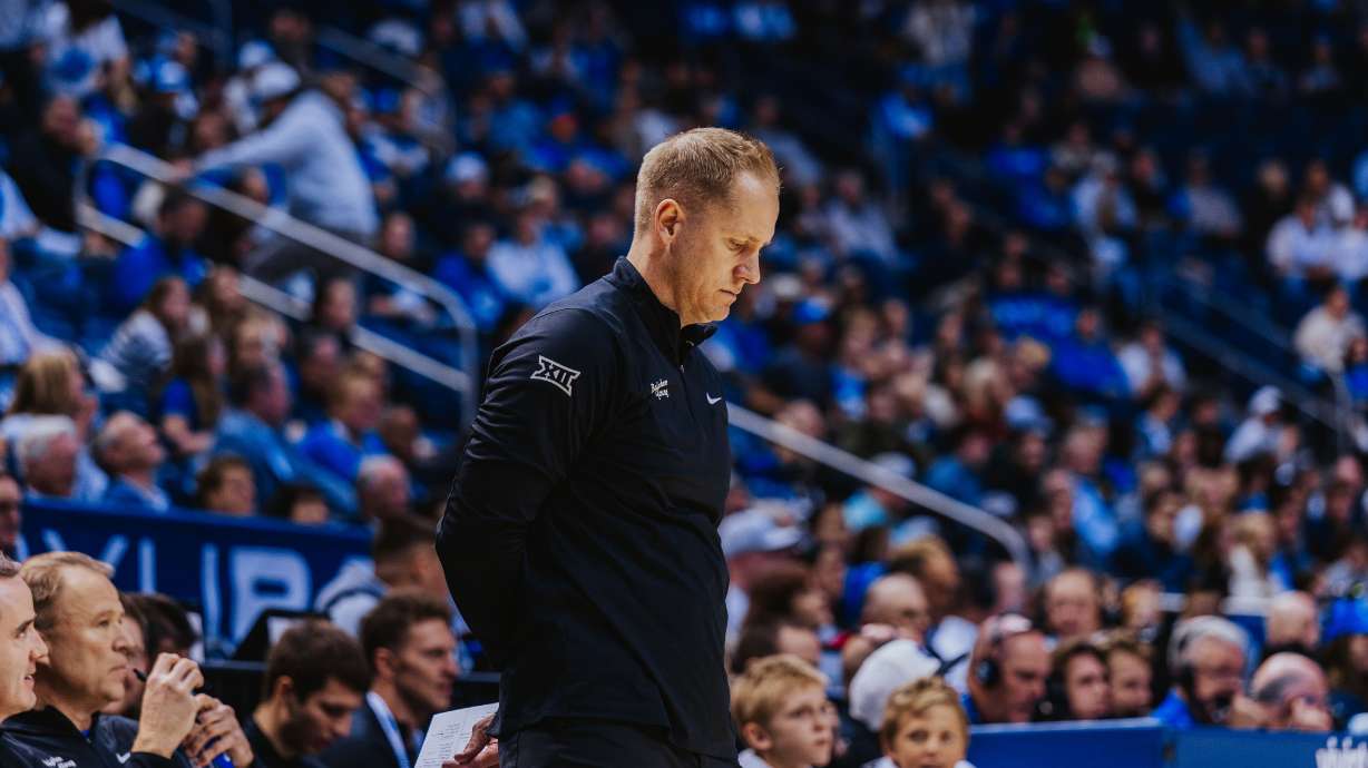 BYU coach Kevin Young looks down during a men's college basketball game against UC Riverside, Saturday, Dec. 13, 2025 in Provo, Utah. After a 16-1 start, the Cougars fell to 4-9 in their last 13 with a loss to Cincinnati on Tuesday, March 3, 2026.