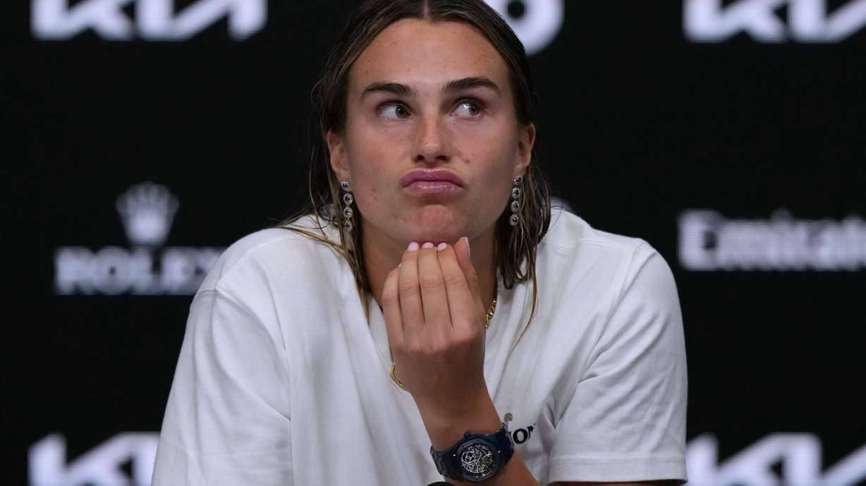 FILE -Aryna Sabalenka of Belarus reacts during a press conference following her loss to Elena Rybakina of Kazakhstan in the women's singles final at the Australian Open tennis championship in Melbourne, Australia, Jan. 31, 2026. , File)