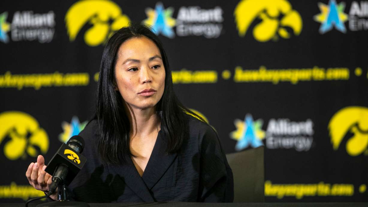 FILE - Iowa women's wrestling head coach Clarissa Chun answers reporters' questions during the Hawkeyes women's wrestling media day on Wednesday, Oct. 18, 2023, at Carver-Hawkeye Arena in Iowa City, Iowa.