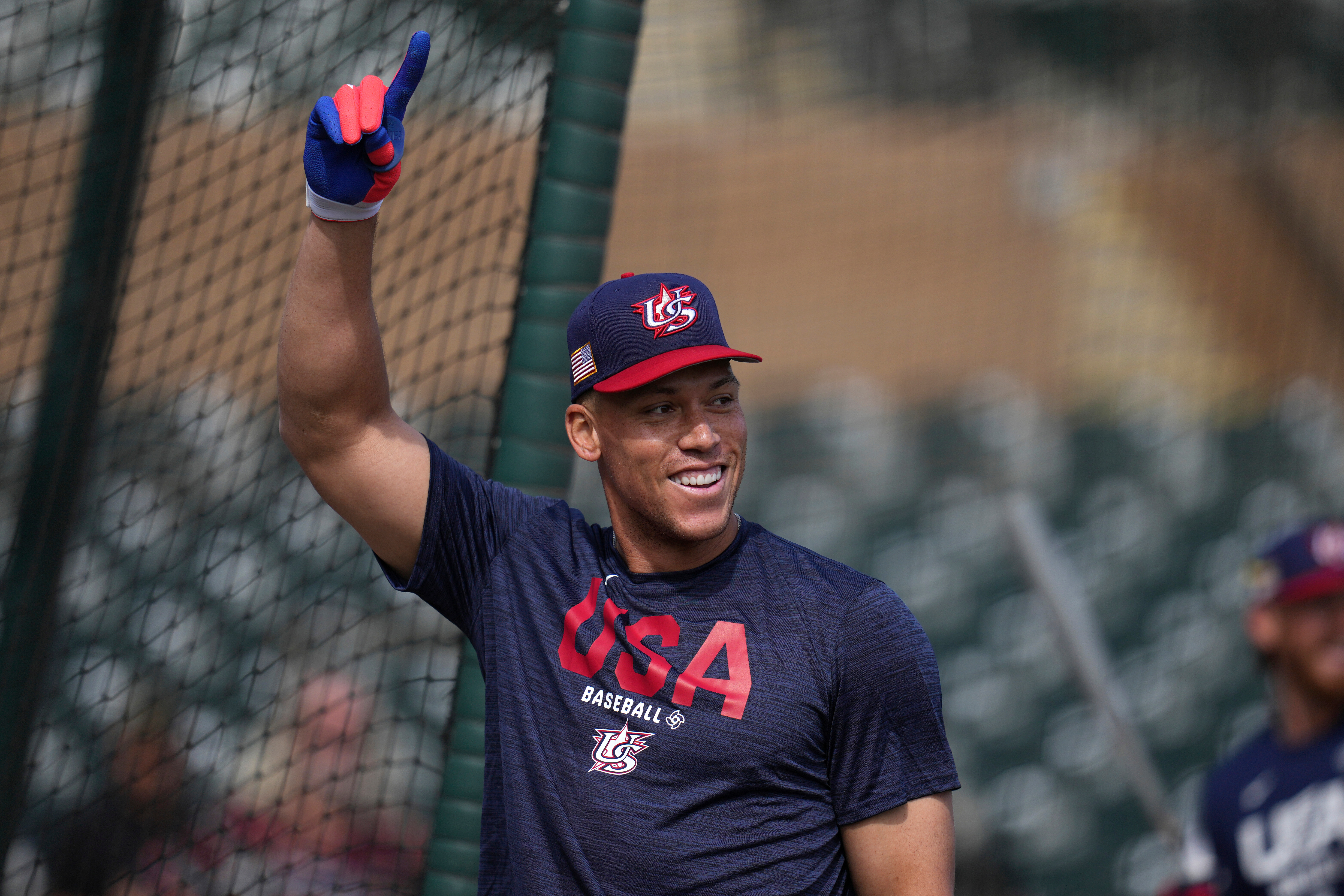United States' Aaron Judge smiles while taking batting practice prior to an exhibition baseball game against the Colorado Rockies Wednesday, March 4, 2026, in Scottsdale, Ariz. 