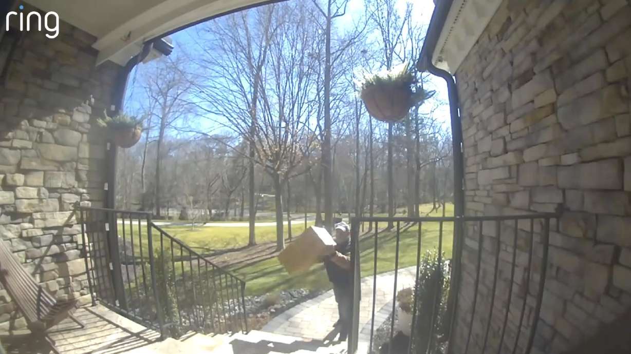 A viral video from Feb. 23 shows an Amazon driver throwing a package on a porch.