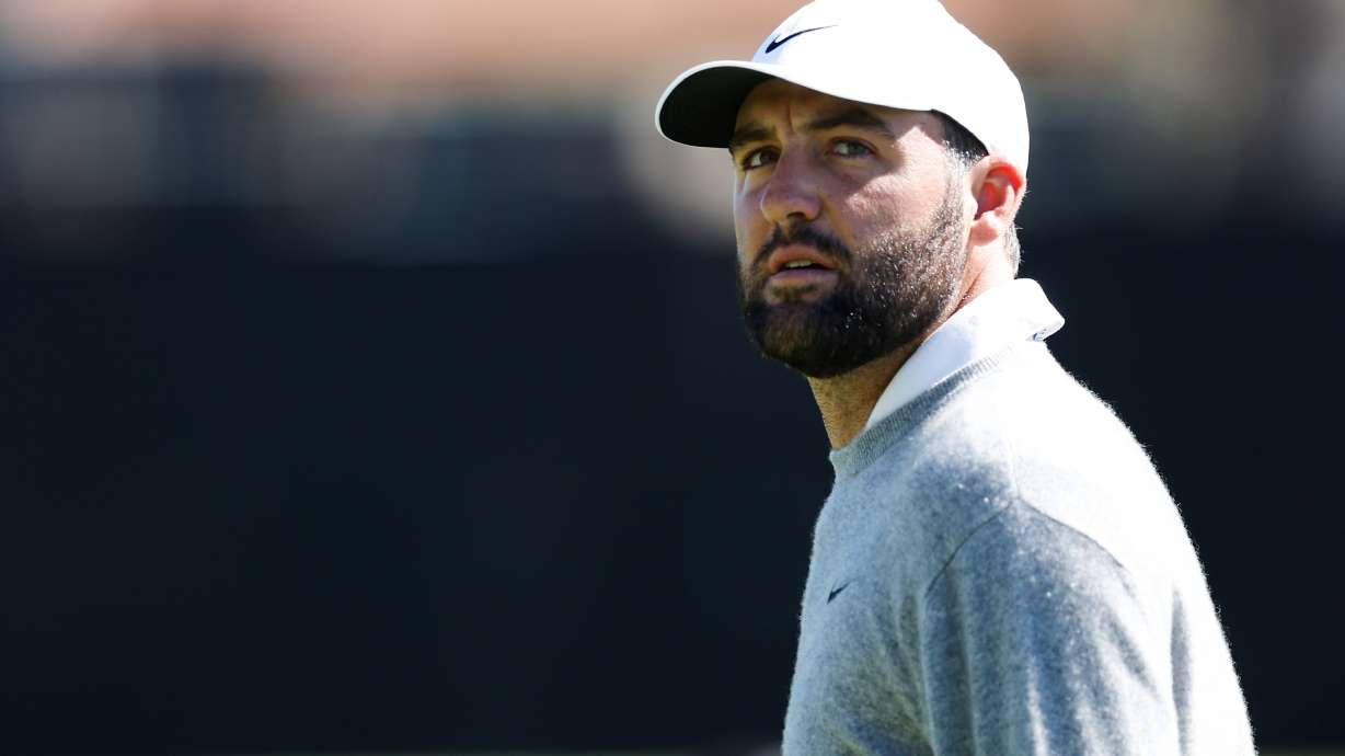 Scottie Scheffler walks on the 18th hole during the third round of the Genesis Invitational golf tournament at Riviera Country Club, Saturday, Feb. 21, 2026, in the Pacific Palisades area of Los Angeles.