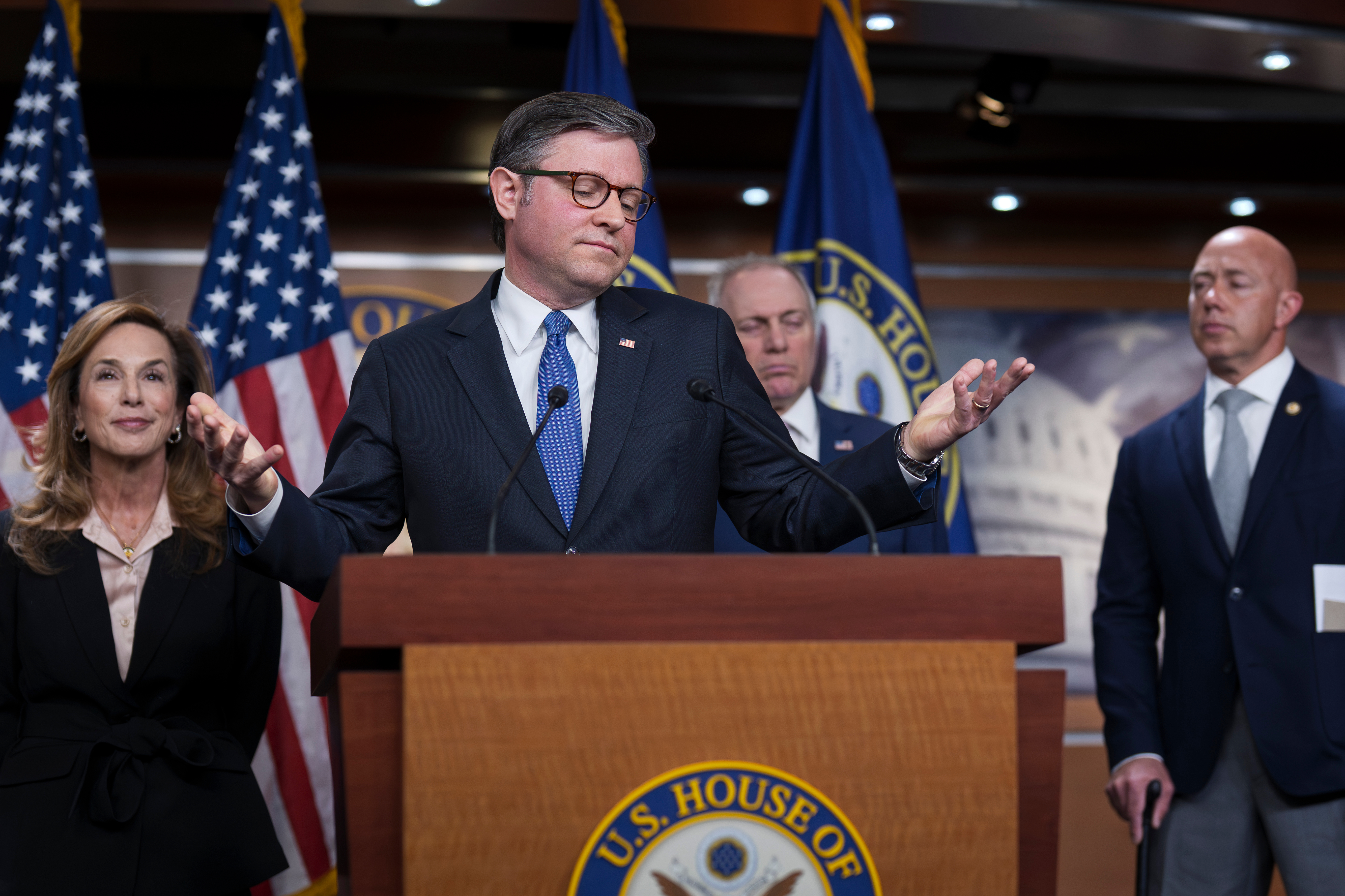 Speaker of the House Mike Johnson, R-La., gestures as he and the GOP leadership talk about the war against Iran, during a news conference at the Capitol in Washington, Wednesday.