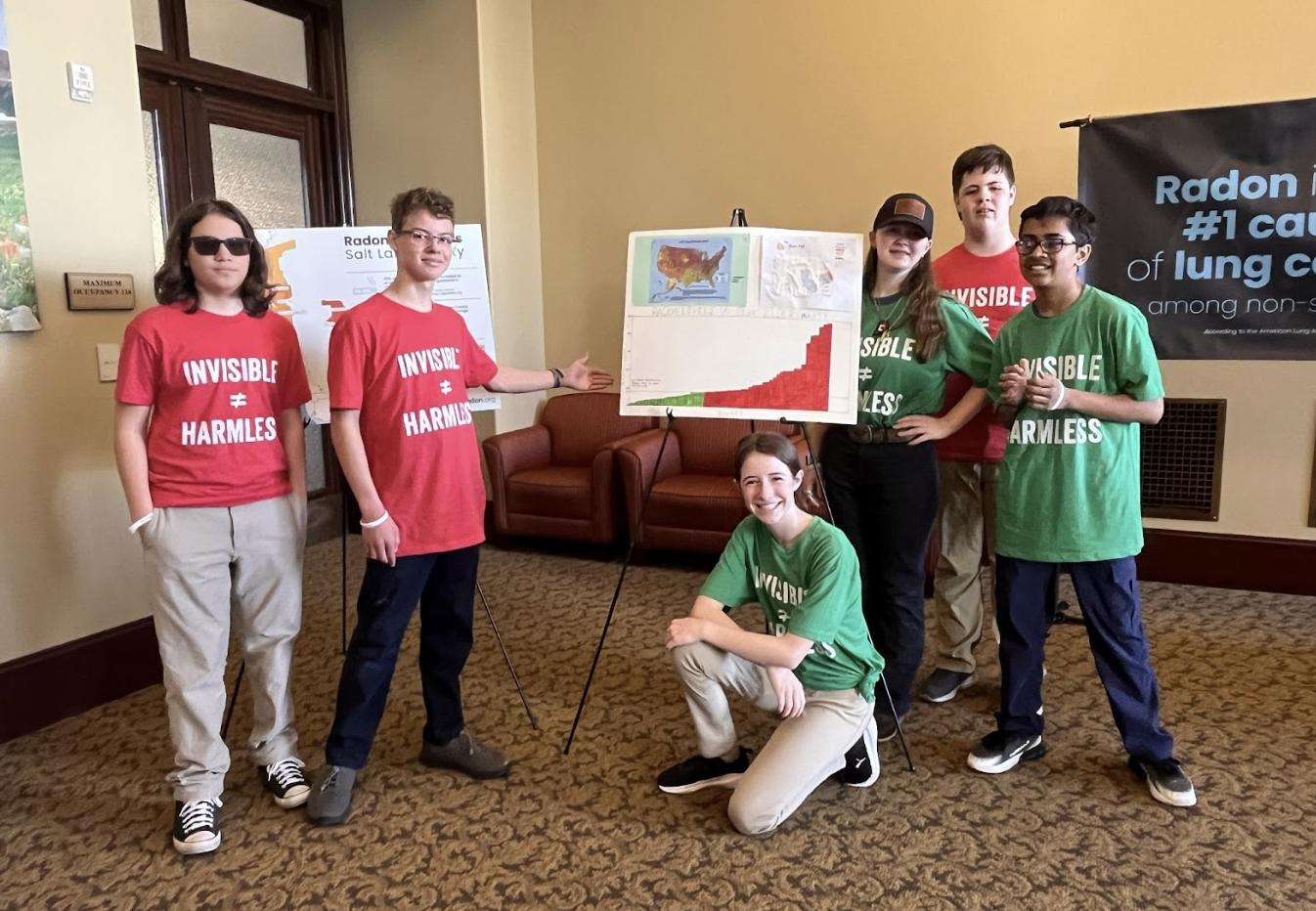 Students from the Promontory School of Expeditionary Learning display their radon test results at the Capitol.