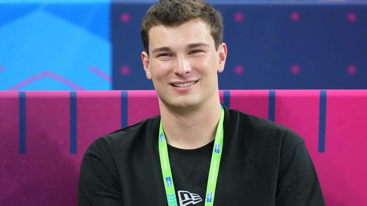 Indiana quarterback Fernando Mendoza (11) watches a drill at the NFL football scouting combine in Indianapolis, Saturday, Feb. 28, 2026.