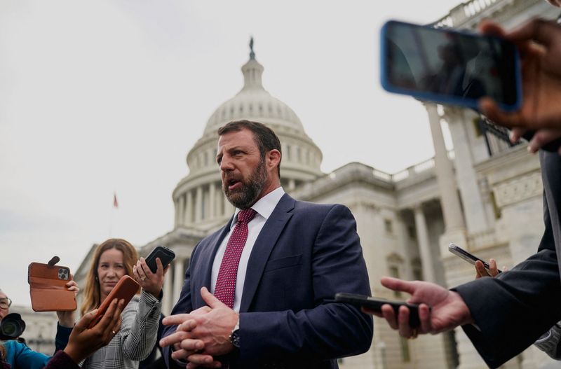 Sen. Markwayne Mullin, R-Okla., tapped by President Donald Trump to replace Homeland Security Secretary Kristi Noem, speaks to members of the media as he departs the Capitol in Washington, Thursday.