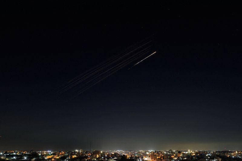An Iranian missile flies toward Israel, amid the conflict with Iran, as seen from Hebron, in the Israeli-occupied West Bank, Thursday. The war entered its sixth day as more strikes pounded Iran and Arab Gulf nations.